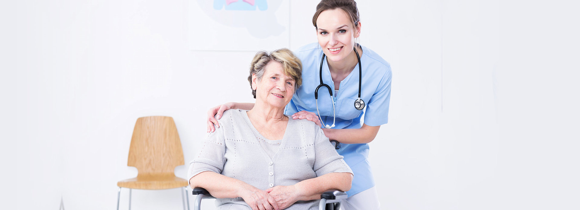 smiling caregiver and old woman